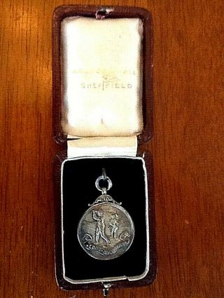 Antique Silver Golf Medal With Sharp Details