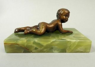 Antique Bronze Figure Of A Baby On An Onyx Base C.  1900