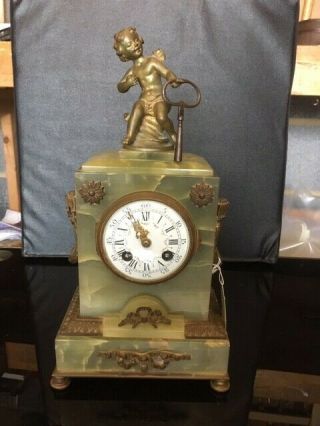 A Late 19th Century French Onyx Mantle Clock