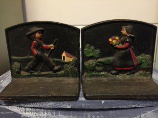 Vintage/antique Cast Iron Bookends,  Raised Relief Walking Man And Woman,  Color