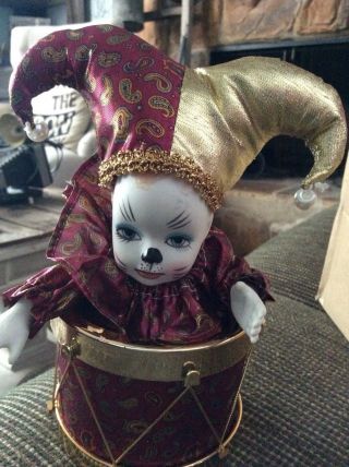 Vintage Music Box Moving Harlequin Court Jester Clown Porcelain Doll In A Drum