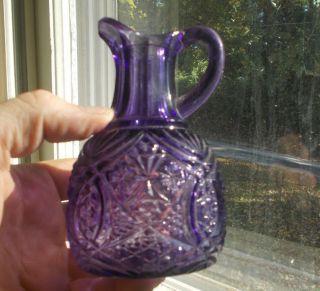 ANTIQUE AMETHYST GLASS 1890s CRUET WITH HANDLE & POUR SPOUT PRESSED PATTERN 5