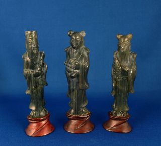 3 Antique Chinese Spinach Jade Or Hardstone Immortals On Carved Wooden Stands