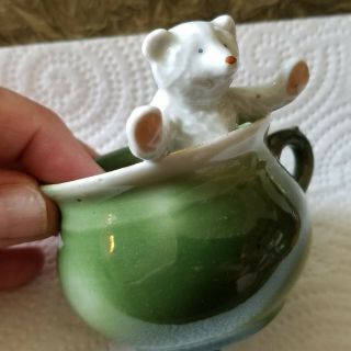 Antique German Porcelain Fairing Teddy Bear In A Cup Or Pot Figurine