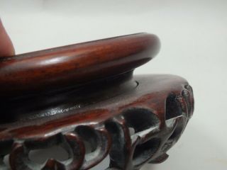 (c) A CHINESE CARVED HARDWOOD DISPLAY STAND ON 5 DOUBLE FEET 19thC 3