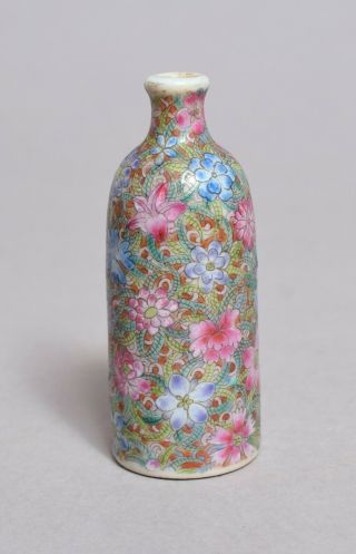 An Antique 19thc Chinese Porcelain Snuff Bottle,  Qianlong Mark 1