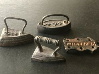 3 Miniature Antique Cast Iron Sad Irons & Trivet