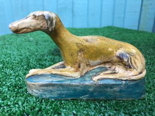 Pottery Recumbent Greyhound Dog On Decorative Base Of Antique Years