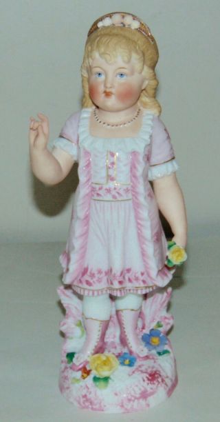Antique Bisque Figurine Little Girl In Pink With Flowers