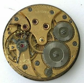 Antique 1934 Longines hand winding mens watch movement w.  seconds,  cal.  12.  687 2