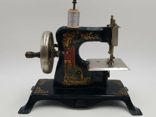 Antique Child’s Toy Sewing Machine Germany Casige Hand Crank Cinderella