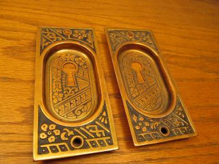 Pair Brass ? Bronze ? Plated Stamped Metal Pocket Door Plates.  Escutcheons