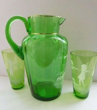 Antique Mary Gregory green glass jug with 2 glasses white children & trumpets 2