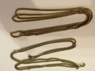Two Antique Chatelaine Chains One Brass One White Metal