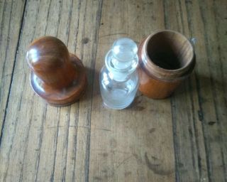 Glass Medicine Bottle In Treen Container,  It Could Be Olive Wood.