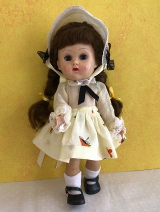 Vintage Vogue Slw Ginny Doll In Her Yellow Tagged Dress.