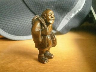 Hand Carved wood netsuke man carries mask and hat boxwood collectable figurine 3