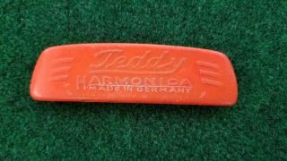 Antique Toy Harmonica,  Teddy Co.  " Happy 