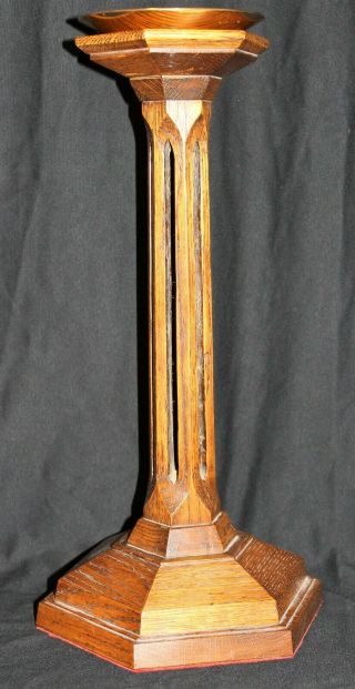 A Large Wooden Candlestick By Gibson Design.