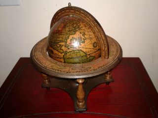 Small vintage zodiac globe,  with wooden base.  Made in Italy. 2