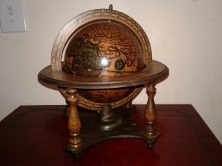Small vintage zodiac globe,  with wooden base.  Made in Italy. 4