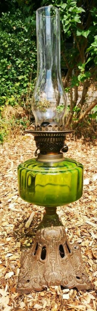 Vintage Oil Lamp.  Cast Iron Base.  Green Glass Font & Chimney.  Duplex Burner.