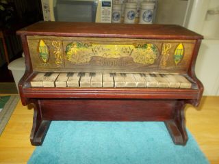 Late 1800s Early 1900s Childs Wooden Piano Made By The Symphony Company 14 Keys