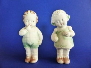 Antique Porcelain Bisque Boy & Girl Figurines,  Hand Painted,  1900s