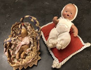 2 Vintage Small Bisque Baby Dolls With Jointed Arms - On Pillow And In Basket