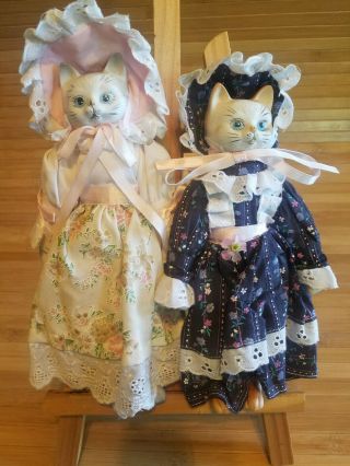2 Vintage Ceramic (head,  Hands,  Feet) Cat Dolls Clothed In Dresses Fabric Body