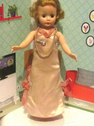 Vintage Cissette Doll Wearing Vintage Pink Romance Dress