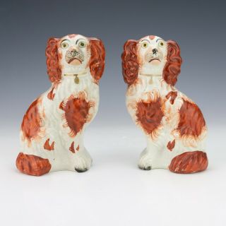 Antique Staffordshire Pottery - Oxblood Painted Seated Dog Figures