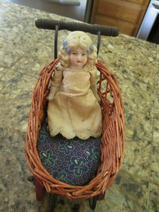 Antique Porcelain Doll With Molded Hair In Repo Buggy