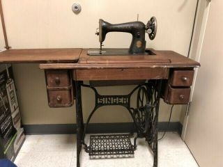 Antique Singer Sewing Machine In Cabinet.