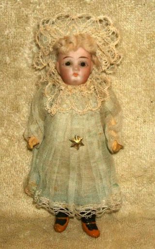 Late 1800 Early 1900 Miniature German Porcelain Doll In Clothes