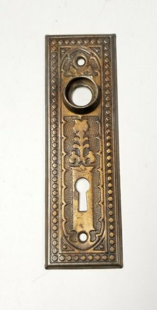 A06 Antique Pressed Metal Ornate Doorknob Backplate 5 5/8 " X 1 3/4 "