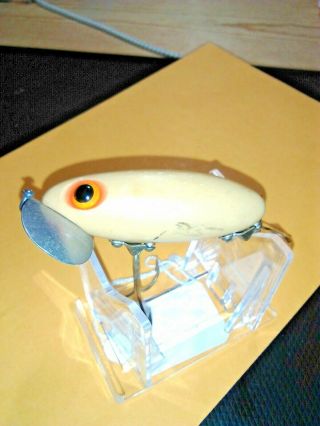 OLD LURE WE HAVE A FRED ARBOGAST WHITE JITTERBUG FOR BASS/WPAT.  ' S. 4