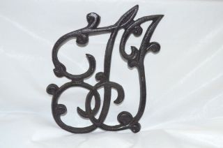Vintage/antique Cast Iron " T.  J.  " Thomas Jefferson Trivet - Stamped 3