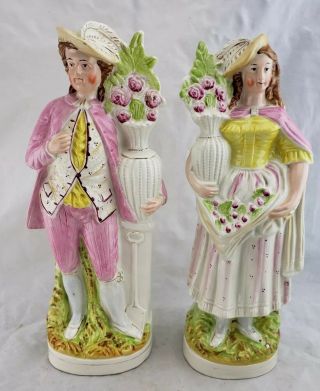2 Antique 19th C.  Staffordshire Victorian Male & Female Figures W/ Flowers 1850s