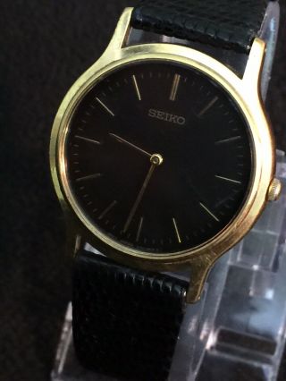 vintage seiko quartz mens watch,  35mm Case Black Face Gold Dail 4