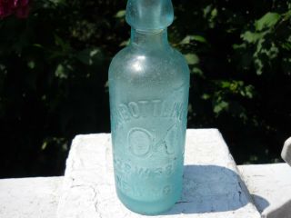 Antique All Natural Sea Glass Bottle.  " O.  K.  Bottling Co.  528 W.  38th St,  York ".
