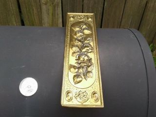 Vintage Brass Wall Plaque On Wood Roses