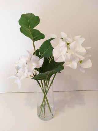 White Plastic Flowers in Vase for Small Dining Room Table 4