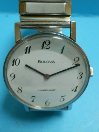 A Vintage " Bulova Longchamp " Stainless Steel Wristwatch.  Gwo.