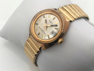 Vintage Timex Ladies Watch Gold Tone Hand Winding With Date Stretched Metal Band