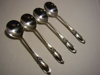 4 Pc Oneida Community Silver Plate White Orchid Round Soup Spoons 7 "