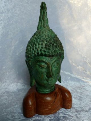 Beautifully serene early 20th C Chinese cast metal Buddha head on a wood plinth 2