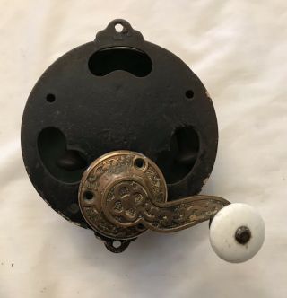 Doorbell,  brass and iron,  hand cranked,  patented August 11,  1868, 5