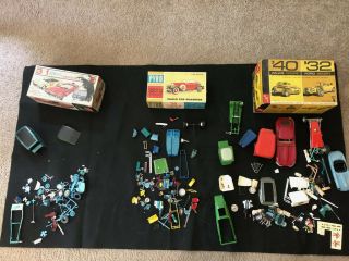 Model Car Junkyard With Five Model Car Boxes.  1964 The Little T Instruction Book