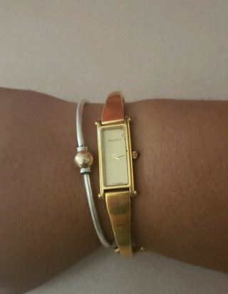 Authentic Gucci Ladies Gold Bangle Watch